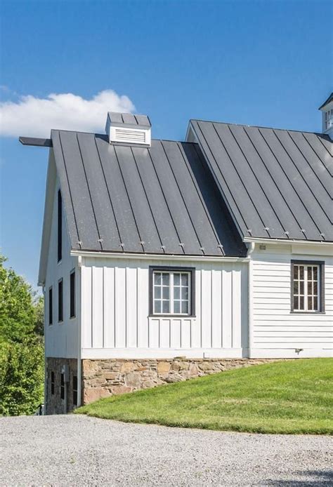 white metal roof on white house|houses with charcoal metal roof.